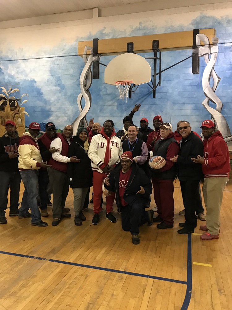 Picture of Kappa Alpha Psi group of men turkey give away
