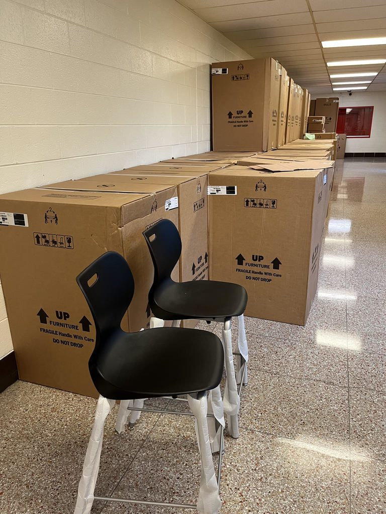 New furniture boxes lining the hallways. 